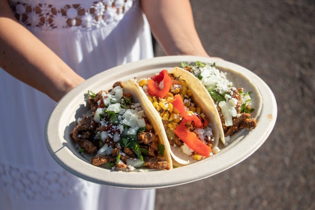 Plate full of delicious tacos from Modern Tortillas catering